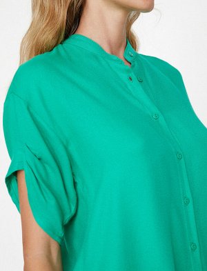 рубашки Материал %100 Вискоз Параметры модели: рост: 173 cm, грудь: 82, талия: 61, бедра: 88 Надет размер: 36