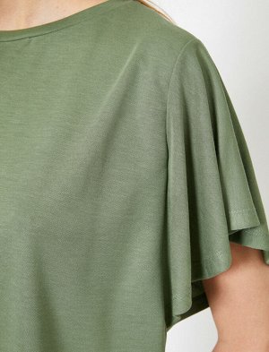 футболки Материал %70 Modal, %30 полиэстер Параметры модели: рост: 177 cm, грудь: 85, талия: 59, бедра: 88 Надет размер: S