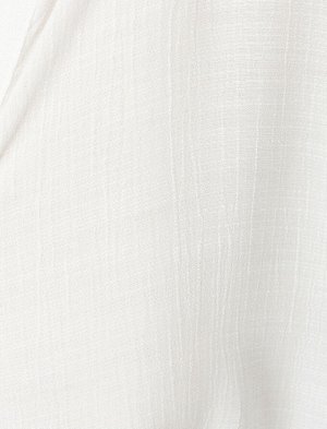 рубашки Материал %69 Вискоз, %31 полиэстер Параметры модели: рост: 177 cm, грудь: 86, талия: 60, бедра: 88 Надет размер: 36
