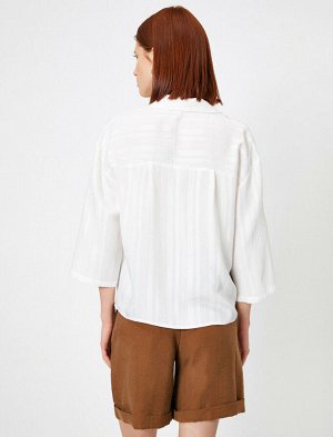 рубашки Материал %86 Вискоз, %14 полиамид Параметры модели: рост: 177 cm, грудь: 86, талия: 60, бедра: 88 Надет размер: 36