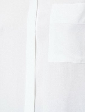 рубашки Материал %100 Вискоз Параметры модели: рост: 176 cm, грудь: 79, талия: 59, бедра: 89 Надет размер: 36