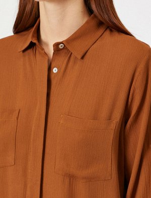 рубашки Материал %100 Вискоз Параметры модели: рост: 177 cm, грудь: 86, талия: 60, бедра: 88 Надет размер: S