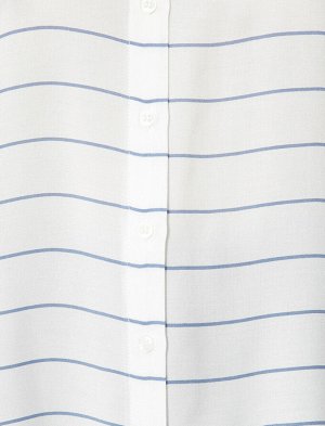 рубашки Материал %100 Вискоз Параметры модели: рост: 177 cm, грудь: 88, талия: 61, бедра: 90 Надет размер: 36
