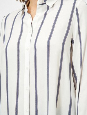 рубашки Материал %100 Вискоз Параметры модели: рост: 177 cm, грудь: 88, талия: 61, бедра: 90 Надет размер: 36