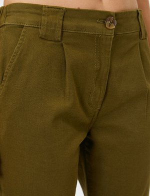брюки Материал: %98 хлопок, %2 Эластан Параметры модели: рост: 176 cm, грудь: 84, талия: 61, бедра: 89 Надет размер: 36
