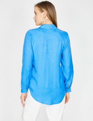 рубашка Материал: %100 вискозыПараметры модели: рост: 180 cm, грудь: 85, талия: 62, бедра: 92 Надет размер: 36