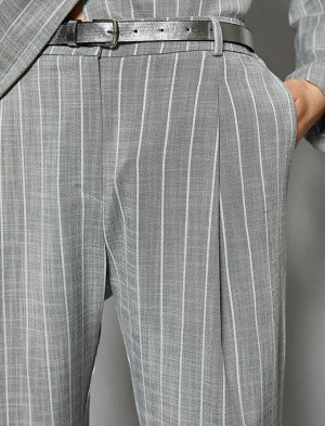 брюки Материал %58 Вискоз, %40 полиэстер, %2 эластан Параметры модели: рост: 179 cm, грудь: 75, талия: 59, бедра: 87 Надет размер: 36