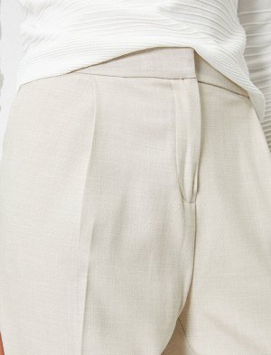 брюки Материал %55 Вискоз, %43 полиэстер, %2 эластан Параметры модели: рост: 180 cm, грудь: 75, талия: 63, бедра: 91 Надет размер: 36