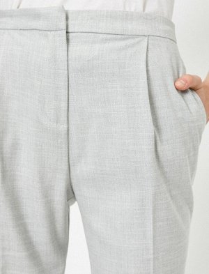 брюки Материал %55 Вискоз, %43 полиэстер, %2 эластан Параметры модели: рост: 177 cm, грудь: 85, талия: 59, бедра: 88 Надет размер: 36