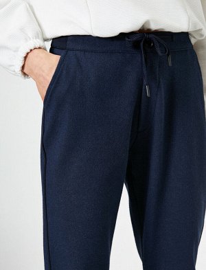 брюки Материал %100 хлопок Параметры модели: рост: 180 cm, грудь: 75, талия: 63, бедра: 91 Надет размер: 36