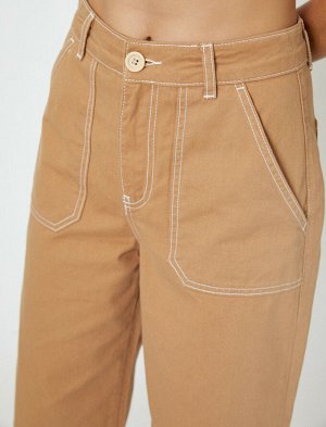 брюки Материал: %100 хлопок Параметры модели: рост: 175 cm, грудь: 81, талия: 60, бедра: 88 Надет размер: 36