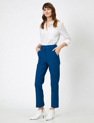 брюки Материал %92 полиэстер, %8 эластан Параметры модели: рост: 176 cm, грудь: 84, талия: 60, бедра: 90 Надет размер: 36