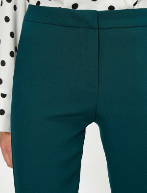 брюки Материал %92 полиэстер, %8 эластан Параметры модели: рост: 173 cm, грудь: 80, талия: 58, бедра: 88 Надет размер: 36