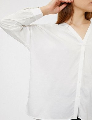 рубашки Материал %100 Вискоз Параметры модели: рост: 178 cm, грудь: 82, талия: 61, бедра: 90 Надет размер: 36