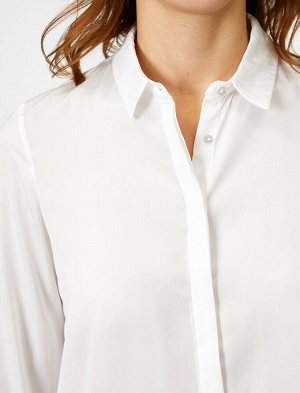 рубашки Материал %100 полиэстер Параметры модели: рост: 178 cm, грудь: 86, талия: 61, бедра: 89 Надет размер: 36