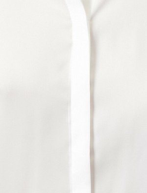 рубашки Материал %100 полиэстер Параметры модели: рост: 178 cm, грудь: 86, талия: 61, бедра: 89 Надет размер: 36