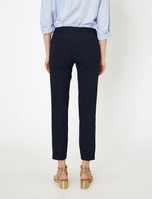 брюки Материал Ana Kumas %92 полиэстер | %8 эластан Параметры модели: рост: 176 cm, грудь: 84, талия: 60, бедра: 90 Надет размер: 36