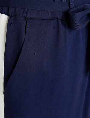 брюки Материал %100 Вискоз Параметры модели: рост: 177 cm, грудь: 86, талия: 60, бедра: 88 Надет размер: 36