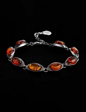 Эффектный браслет из натурального коньячного янтаря, украшенный фианитами «Ренессанс»