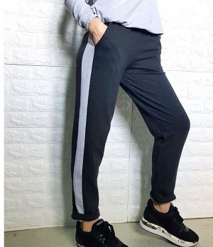 Брюки Молодежные брюки с длиной 7/8 и манжетом по низу, выполнены из трикотажа.
цвет: антрацит. По бокам брюк имеются карманы и светлые вставки. 
Ткань: двунитка