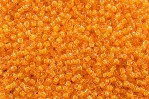 Бисер японский TOHO круглый 11/0 #0801 мандарин, окрашенный изнутри неон, светится в ультрафиолете, 10 грамм