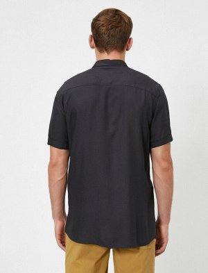 Рубашка Материал: %100  Вискоз Параметры модели: рост: 188 cm, грудь: 99, талия: 75, бедра: 95 Надет размер: M