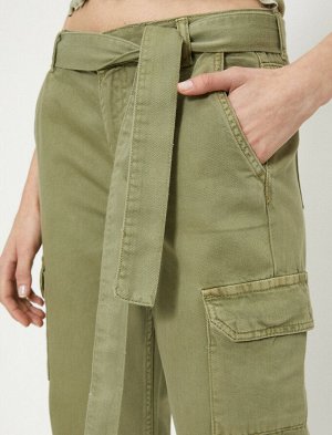 брюки Материал: %100 хлопок Параметры модели: рост: 175 cm, грудь: 80, талия: 59, бедра: 88 Надет размер: 36