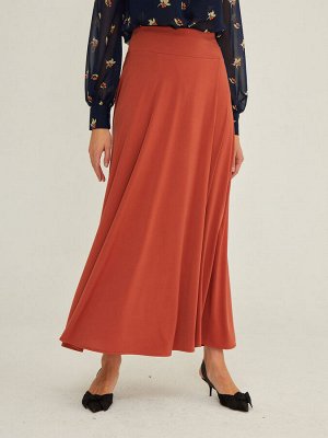 Юбка Длинная юбка-полусолнце макси из коллекции ALINA ASSI BASIC. Юбка с широкой плотной кокеткой, плотно утягивает по фигуре и держит форму.