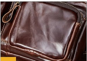 Felix Многофункциональная мужская поясная сумка из натуральной кожи. Длинна ремня 105см. Вместительное отделение для личных вещей. Впереди имеется отделение на молнии и карман с клапаном на пряжке. Вм