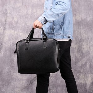 Bukha Большая многофункциональная элегантная деловая мужская сумка из натуральной кожи с очень вместительным отделением закрытым на молнию. Внутри помещаются ноутбук, небольшие гаджеты и бумаги формат