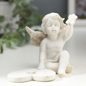 Сувенир полистоун "Белоснежный ангел собирает пазл" 6,8х8,5х7,5 см