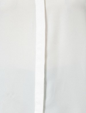 рубашка Материал: %100 Полиэстер Параметры модели: рост: 178 cm, грудь: 82, талия: 60, бедра: 90 Надет размер: 36