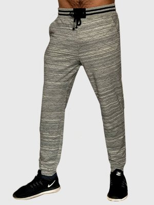 Крутые мужские штаны джоггеры On the byas – пояс и щиколотки оформляют широкие эластичные манжеты