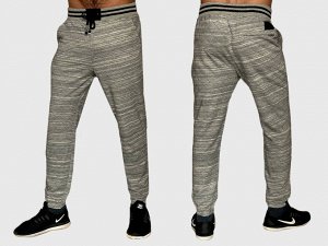 Крутые мужские штаны джоггеры On the byas – пояс и щиколотки оформляют широкие эластичные манжеты