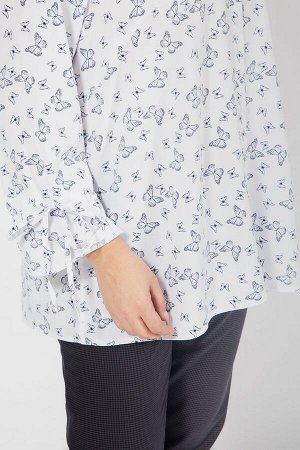 Рубашка Женственная рубашка из блузочной ткани  "принт". Воротник - рубашечного типа. По переду планка по всей длине изделия, с застежкой на петли и пуговицы.  Втачной рукав по низу  дополнен кулисой.
