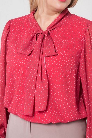 Блузка Женственная блуза на подкладке, верх - шифон в мелкий принт, нижний слой - однотон. Оригинальный воротник-стойка, переходящий в бант, создает эффектный акцент. Втачные длинные рукава со сборкой
