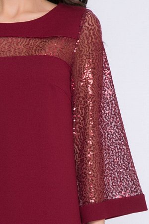 Платье Платье трапецевидного силуэта из трикотажного полотна.Рукава втачные из сетки с пайетками.
30% вискоза,65% п/э,5% лайкра