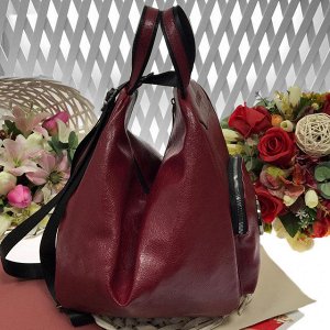 Шикарная сумка-рюкзак Co_GO из эко-кожи стильной фактуры цвета спелой вишни.