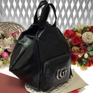 Шикарная сумка-рюкзак Co_GO из эко-кожи стильной фактуры чёрного цвета.