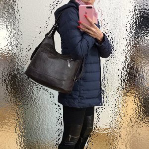 Функциональная сумка-рюкзак Verita из качественной матовой эко-кожи кофейного цвета.