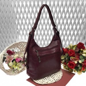 Функциональная сумка-рюкзак Verita из качественной матовой эко-кожи цвета спелой вишни.