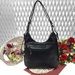 Функциональная сумка-рюкзак Verita из качественной матовой эко-кожи черного цвета.