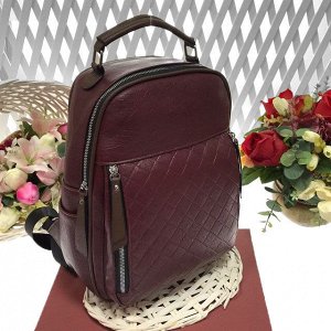 Модный рюкзак Omnia из плотной эко-кожи цвета спелой вишни.