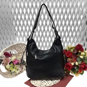 Функциональная сумка-рюкзак Eve из качественной матовой эко-кожи черного цвета.