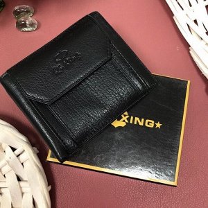 Мужской кошелек Xing Qi двойного сложения из натуральной кожи чёрного цвета.