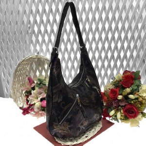Стильная женская сумочка Sabberia из натуральной замши с лазерной обработкой чёрного цвета.