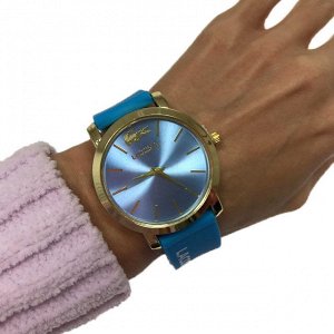 Женские часы Lastella с силиконовым ремешком голубого цвета.
