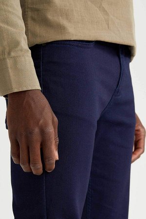 брюки Размеры модели: рост: 1,88 грудь: 95 талия: 70 Надет размер: размер 30 - рост 32  Хлопок 66%,Elastan 2%, Полиэстер 32%