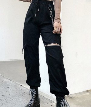 Женские брюки джоггеры, на резинке, декоративные элементы &quot;Цепочки и молния на бедре&quot;, цвет черный