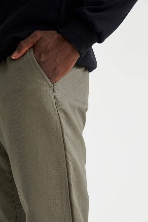 брюки Размеры модели: рост: 1,88 грудь: 95 талия: 70 Надет размер: размер 32 - рост 32  Хлопок 100%